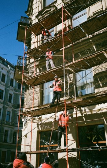 men-on-brown-scaffolding-2209529